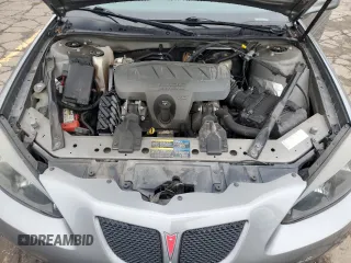2007 Pontiac Grand Prix z VIN 2G2WP552171223907, wystawiony jako Copart lot #55470435 z przebiegiem 106 754 mil mil oraz Tytuł czysty. Historia ofert i sprzedaży dostępna na DreamBid. Obrazek 11.