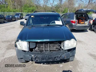 2006 Jeep Grand Cherokee Limited with VIN 1J4HR58NX6C114451, listed as a IAAI auction lot 42093832 with 264,418 mi miles. Bid and sale history available at carsss.com. Image 13.