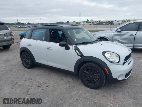 2015 MINI Countryman S z VIN WMWZC3C5XFWP53190, wystawiony jako IAAI lot #41273123 z przebiegiem 163 658 mil mil oraz . Historia ofert i sprzedaży dostępna na DreamBid. Obrazek 1.