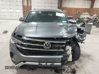 2022 Volkswagen Atlas SE z VIN 1V2KE2CA1NC206765, wystawiony jako IAAI lot #41876747 z przebiegiem 83 304 mil mil oraz . Historia ofert i sprzedaży dostępna na DreamBid. Obrazek 12.