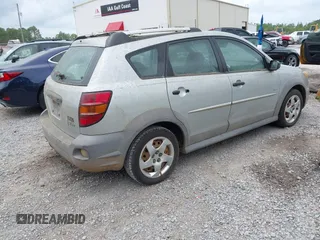 2004 Pontiac Vibe with VIN 5Y2SL62864Z465907, listed as a IAAI auction lot 42102597 with 164,548 mi miles. Bid and sale history available at carsss.com. Image 4.