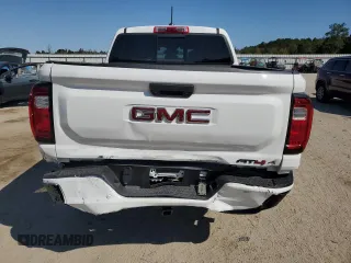 2023 GMC Canyon 4WD AT4X with VIN 1GTP6EEK6P1235222, listed as a Copart auction lot 75664684 with 9,736 mi miles and Salvage Title. Bid and sale history available at carsss.com. Image 6.