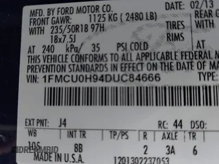2013 Ford Escape SEL with VIN 1FMCU0H94DUC84666, listed as a IAAI auction lot 42001644 with 165,269 mi miles. Bid and sale history available at carsss.com. Image 9.