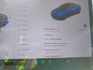 2018 Tesla Model 3 Long Range Battery with VIN 5YJ3E1EA4JF011799, listed as a IAAI auction lot 41765860 with 133,098 mi miles. Bid and sale history available at carsss.com. Image 7.