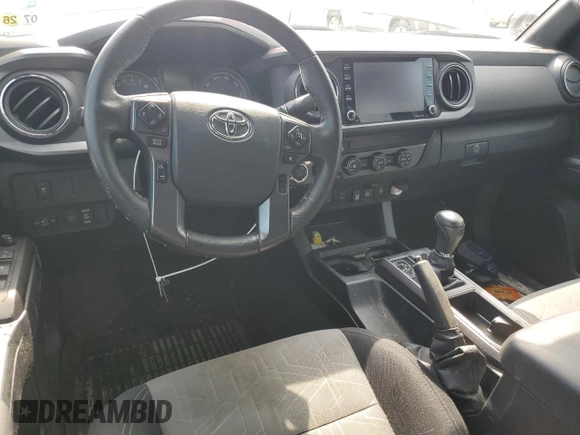 2020 Toyota Tacoma SR5 z VIN 3TMCZ5AN7LM302123, wystawiony jako Copart lot #57299805 z przebiegiem 43 244 mil mil oraz Szkoda całkowita • Salvage title. Historia ofert i sprzedaży dostępna na DreamBid. Obrazek 8.