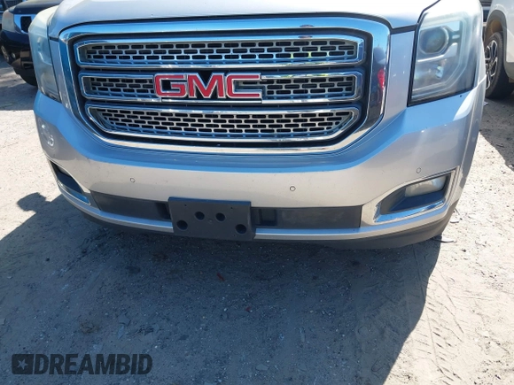 2015 GMC Yukon XL SLT with VIN 1GKS1HKC8FR221608, listed as a IAAI auction lot 42044318 with 215,757 mi miles. Bid and sale history available at carsss.com. Image 6.