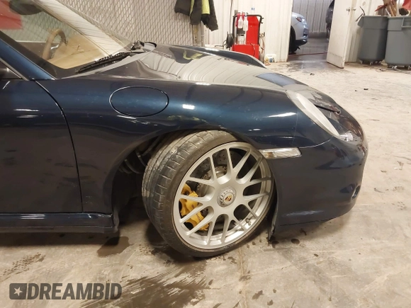 2011 Porsche 911 Turbo with VIN WP0AD2A93BS766801, listed as a IAAI auction lot 41566167 with 66,785 mi miles. Bid and sale history available at carsss.com. Image 18.