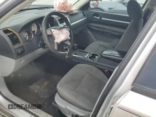 2008 Dodge Charger z VIN 2B3KA43GX8H248254, wystawiony jako Copart lot #55070915 z przebiegiem 196 269 mil mil oraz Szkoda całkowita • Salvage title. Historia ofert i sprzedaży dostępna na DreamBid. Obrazek 7.
