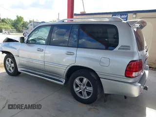 2006 Lexus LX 470 z VIN JTJHT00W864014757, wystawiony jako IAAI lot #42332814 z przebiegiem 131 641 mil mil oraz . Historia ofert i sprzedaży dostępna na DreamBid. Obrazek 15.
