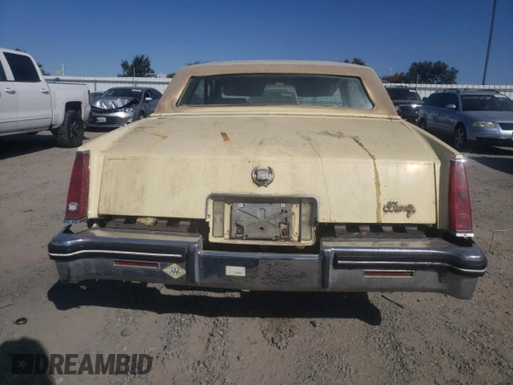 1982 Cadillac Eldorado z VIN 1G6AL578XCE608090, wystawiony jako Copart lot #73839654 z przebiegiem 22 185 mil mil oraz Czysty tytuł • Clean title. Historia ofert i sprzedaży dostępna na DreamBid. Obrazek 6.