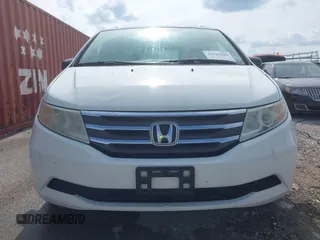 2011 Honda Odyssey EX-L with VIN 5FNRL5H60BB026171, listed as a IAAI auction lot 42511296 with 288,827 mi miles and . Bid and sale history available at DreamBid. Image 12.