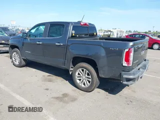 2016 GMC Canyon 4WD SLT with VIN 1GTP6DE15G1323650, listed as a IAAI auction lot 42097101 with 240,662 mi miles. Bid and sale history available at carsss.com. Image 3.