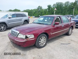 2005 Mercury Grand Marquis LS Premium z VIN 2MEHM75W05X636003, wystawiony jako IAAI lot #42480277 z przebiegiem 224 789 mil mil oraz . Historia ofert i sprzedaży dostępna na DreamBid. Obrazek 18.