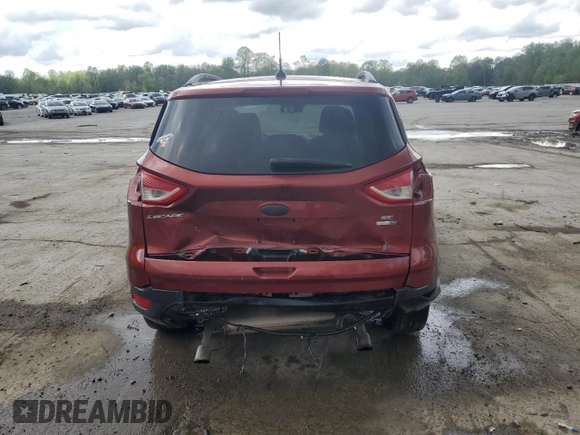 2015 Ford Escape SE with VIN 1FMCU9GX2FUB47068, listed as a Copart auction lot 54772975 with 97,348 mi miles and Salvage Title. Bid and sale history available at DreamBid. Image 6.