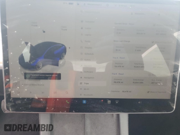 2022 Tesla Model 3 with VIN 5YJ3E1EA4NF371483, listed as a Copart auction lot 49287665 with 59,476 mi miles and Salvage Title. Bid and sale history available at DreamBid. Image 9.