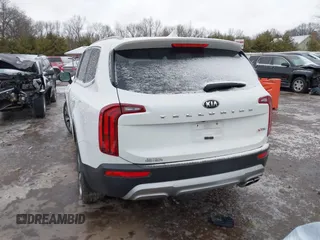 2020 Kia Telluride S with VIN 5XYP64HC4LG036632, listed as a IAAI auction lot 41734210 with 97,502 mi miles and . Bid and sale history available at carsss.com. Image 3.