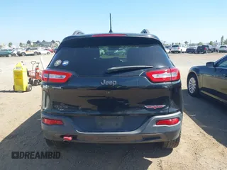 2016 Jeep Cherokee Trailhawk with VIN 1C4PJMBB9GW179051, listed as a IAAI auction lot 42520342 with 100,538 mi miles and . Bid and sale history available at DreamBid. Image 16.