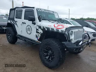 2014 Jeep Wrangler Unlimited Sahara z VIN 1C4BJWEG4EL197047, wystawiony jako IAAI lot #42330914 z przebiegiem 187 431 mil mil oraz . Historia ofert i sprzedaży dostępna na DreamBid. Obrazek 1.