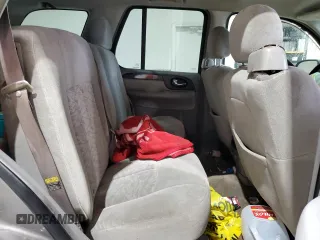 2005 GMC Envoy SLE с VIN 1GKDS13S752274178, выставлен на аукционе Copart как лот 55289005 с пробегом 199 378 миль миль и Списание • Salvage title. История ставок и продаж доступна на DreamBid. Изображение 11.