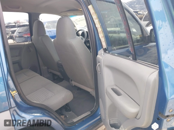 2005 Jeep Liberty Sport with VIN 1J4GL48K45W599048, listed as a IAAI auction lot 41603457 with 107,781 mi miles. Bid and sale history available at carsss.com. Image 8.