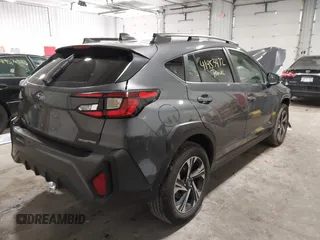2024 Subaru Crosstrek Premium with VIN JF2GUADC8R8211377, listed as a IAAI auction lot 41953472 with 31,973 mi miles and . Bid and sale history available at DreamBid. Image 4.