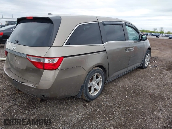 2012 Honda Odyssey EX-L with VIN 5FNRL5H68CB031930, listed as a IAAI auction lot 42222501 with 65,262 mi miles and . Bid and sale history available at DreamBid. Image 4.