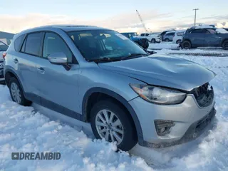 2016 Mazda CX-5 Touring with VIN JM3KE4CY9G0904000, listed as a IAAI auction lot 41186630 with 73,900 mi miles. Bid and sale history available at carsss.com. Image 1.
