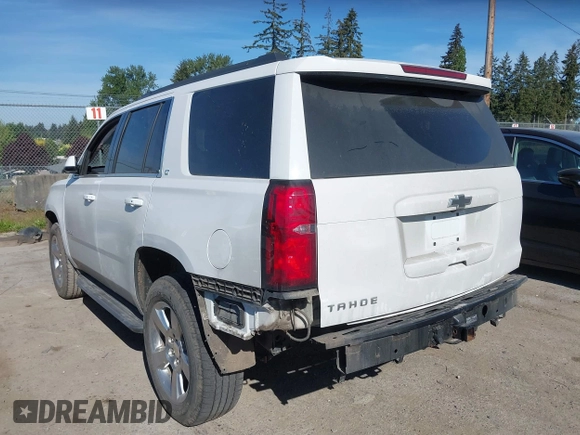 2016 Chevrolet Tahoe LT with VIN 1GNSKBKC9GR272257, listed as a IAAI auction lot 42193967 with 101,967 mi miles and . Bid and sale history available at DreamBid. Image 3.