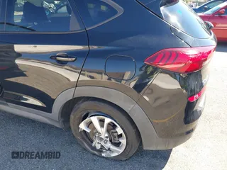 2021 Hyundai Tucson Value z VIN KM8J33A43MU306697, wystawiony jako IAAI lot #41869100 z przebiegiem 129 776 mil mil oraz . Historia ofert i sprzedaży dostępna na DreamBid. Obrazek 6.