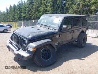 2018 Jeep Wrangler Unlimited Sport S with VIN 1C4HJXDN1JW216825, listed as a IAAI auction lot 42405799 with 37,194 mi miles and . Bid and sale history available at DreamBid. Image 2.