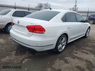 2013 Volkswagen Passat TDI SE with VIN 1VWBN7A34DC075197, listed as a IAAI auction lot 41707346 with 188,685 mi miles. Bid and sale history available at carsss.com. Image 4.
