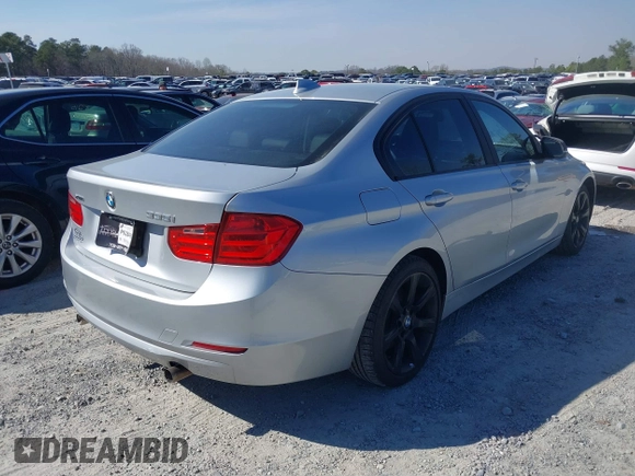 2014 BMW 3 Series 335i xDrive with VIN WBA3B9G52ENR91044, listed as a IAAI auction lot 41807408 with 200,000 mi miles and . Bid and sale history available at carsss.com. Image 4.