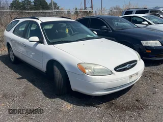 2003 Ford Taurus SE Standard z VIN 1FAFP58283A155067, wystawiony jako Copart lot #54555045 z przebiegiem 159 296 mil mil oraz Tytuł czysty. Historia ofert i sprzedaży dostępna na DreamBid. Obrazek 1.