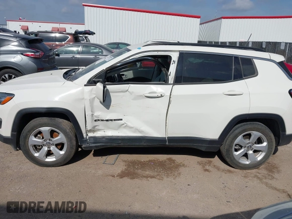 2021 Jeep Compass Latitude with VIN 3C4NJCBBXMT563942, listed as a IAAI auction lot 42045108 with 166,153 mi miles and . Bid and sale history available at DreamBid. Image 14.