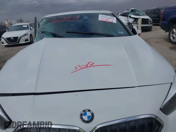 2022 BMW 2 Series 228i with VIN WBA53AK04N7J89232, listed as a IAAI auction lot 41692549 with 1 mi miles. Bid and sale history available at carsss.com. Image 10.