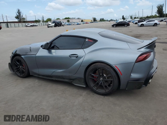 2022 Toyota Supra 3.0 with VIN WZ1DB0C09NW047931, listed as a Copart auction lot 59527955 with 61,941 mi miles and Salvage title. Bid and sale history available at DreamBid. Image 2.