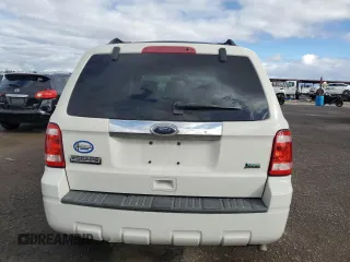 2010 Ford Escape Limited z VIN 1FMCU0EG8AKB93264, wystawiony jako Copart lot #48755805 z przebiegiem 69 141 mil mil oraz Szkoda całkowita • Salvage title. Historia ofert i sprzedaży dostępna na DreamBid. Obrazek 6.