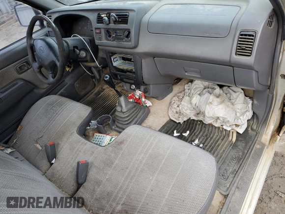 1998 Nissan Frontier XE with VIN 1N6DD21S3WC381722, listed as a Copart auction lot 86492454 with Not provided miles and Salvage title. Bid and sale history available at DreamBid. Image 8.