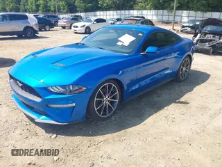 2019 Ford Mustang EcoBoost with VIN 1FA6P8TH3K5124197, listed as a IAAI auction lot 42579034 with 57,965 mi miles and . Bid and sale history available at DreamBid. Image 2.