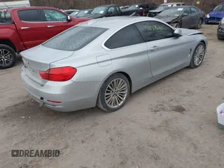 2014 BMW 4 Series 428i xDrive with VIN WBA3N5C53EF716542, listed as a IAAI auction lot 41157641 with 135,264 mi miles and . Bid and sale history available at DreamBid. Image 4.