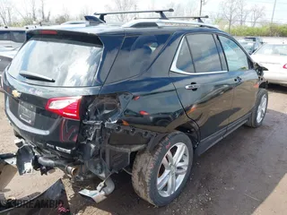 2018 Chevrolet Equinox Premier with VIN 2GNAXWEX4J6252486, listed as a IAAI auction lot 41925794 with 136,040 mi miles. Bid and sale history available at carsss.com. Image 4.