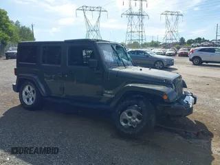2015 Jeep Wrangler Unlimited Altitude z VIN 1C4HJWEG0FL752152, wystawiony jako IAAI lot #42311043 z przebiegiem 112 379 mil mil oraz . Historia ofert i sprzedaży dostępna na DreamBid. Obrazek 17.