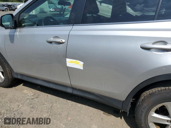 2014 Toyota RAV4 XLE with VIN 2T3RFREV3EW157703, listed as a Copart auction lot 68909594 with 69,305 mi miles and Salvage Title. Bid and sale history available at carsss.com. Image 12.