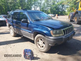 2003 Jeep Grand Cherokee Laredo with VIN 1J4GW48S23C540229, listed as a IAAI auction lot 42627138 with 202,260 mi miles and . Bid and sale history available at DreamBid. Image 1.
