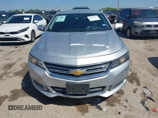 2014 Chevrolet Impala LT with VIN 2G1125S35E9102161, listed as a IAAI auction lot 41976891 with 129,408 mi miles and . Bid and sale history available at DreamBid. Image 13.
