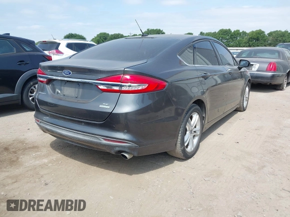 2018 Ford Fusion SE with VIN 3FA6P0HD8JR277127, listed as a IAAI auction lot 42040109 with 118,795 mi miles. Bid and sale history available at carsss.com. Image 4.