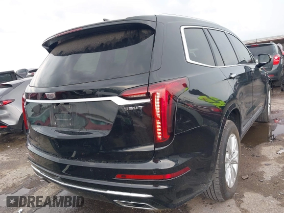 2023 Cadillac XT6 FWD Luxury z VIN 1GYKPAR43PZ147512, wystawiony jako IAAI lot #42175720 z przebiegiem 31 520 mil mil oraz . Historia ofert i sprzedaży dostępna na DreamBid. Obrazek 4.