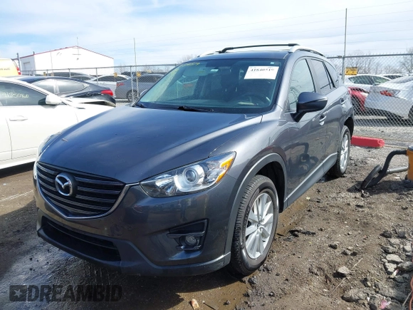2016 Mazda CX-5 Touring with VIN JM3KE4CY9G0915305, listed as a IAAI auction lot 41840519 with 188,702 mi miles and . Bid and sale history available at carsss.com. Image 17.