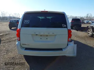 2019 Dodge Grand Caravan SE with VIN 2C4RDGBG2KR799660, listed as a IAAI auction lot 41898556 with 104,642 mi miles and . Bid and sale history available at DreamBid. Image 17.