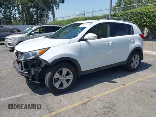 2013 Kia Sportage LX with VIN KNDPB3A23D7514304, listed as a IAAI auction lot 42544397 with 82,456 mi miles and . Bid and sale history available at DreamBid. Image 19.